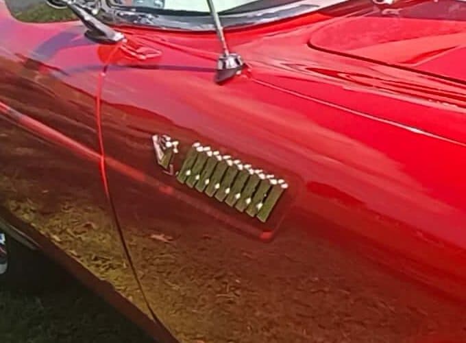 Chrome fender vents on the side of the 1955 Thunderbird